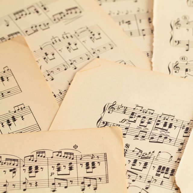Sheet music on pages in a pile