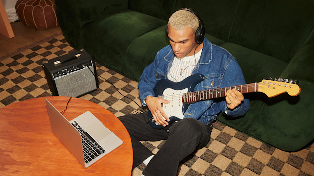 Man recording music using mobile studio