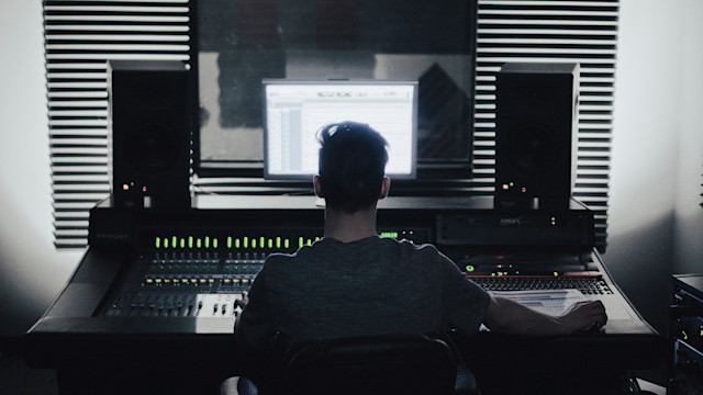 Man working as audio engineer