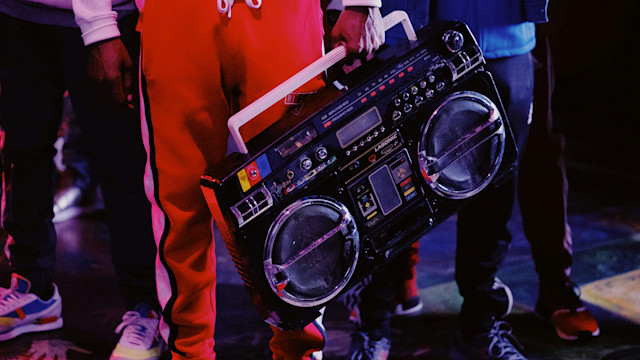 Man holding a Boom Box