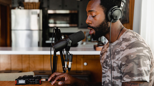 A male singer recording and mixing vocals in Soundtrap