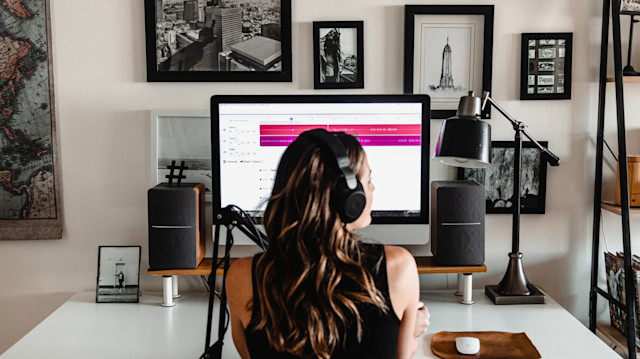 Woman writing music in her studio