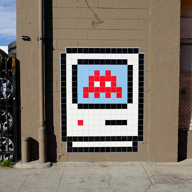 A wall painting of 8 bit retro gameboy