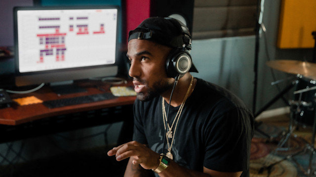 Studio engineer giving feedback on recording